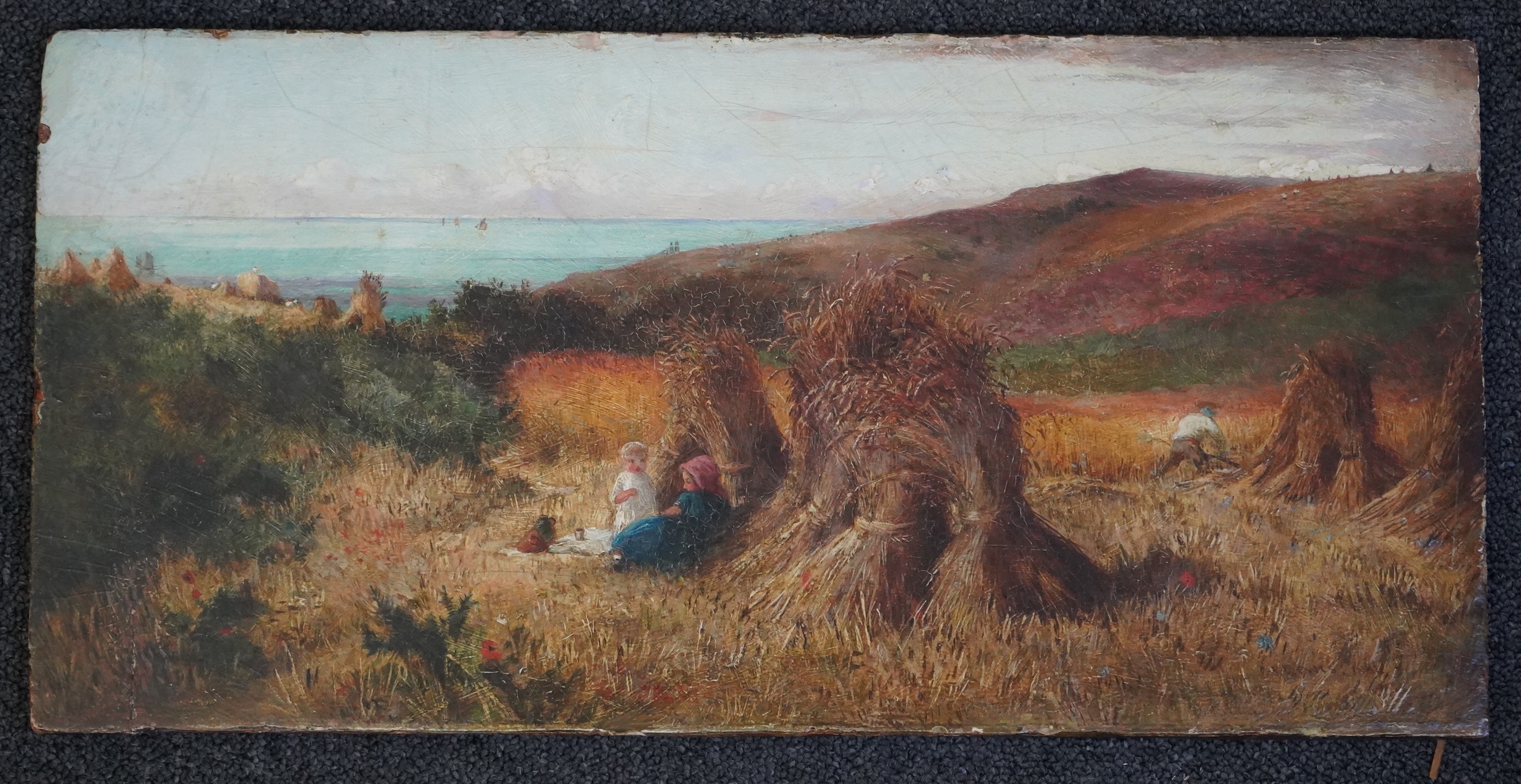 Charles James Lewis (British, 1830-1892), Harvest field, Guernsey, oil on wooden panel, 24 x 49.5cm